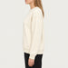 French Disorder women Ski Track Sweater in Coconut - model side | London Ski Co