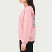 French Disorder women Winter Pack Sweater in Light Pink - model side | London Ski Co